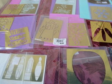 BRASS STENCILS, CARD BLANKS, AND NOTEBOOK TO STORE YOUR STENCILS