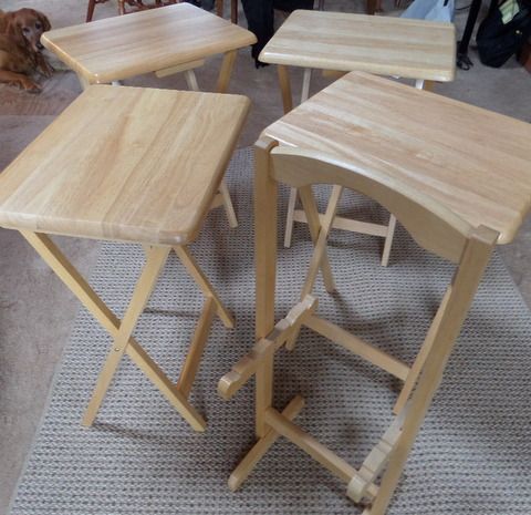 QUITE NICE SET OF WOODEN TV TRAYS WITH STAND.