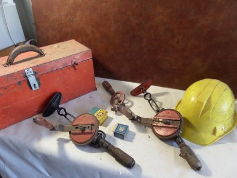 VINTAGE HAND DRILLS WITH TOOL BOX AND HARD HAT