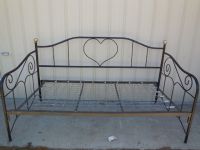 PRETTY BLACK DAY BED WITH HEART DESIGN ON THE BACK