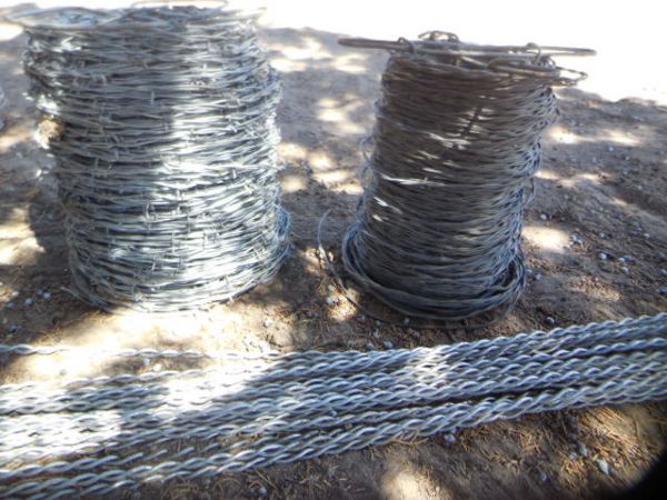 FOUR BARB GALVANIZED WIRE, BARBLESS WIRE AND GALVANIZED WIRE SPREADERS