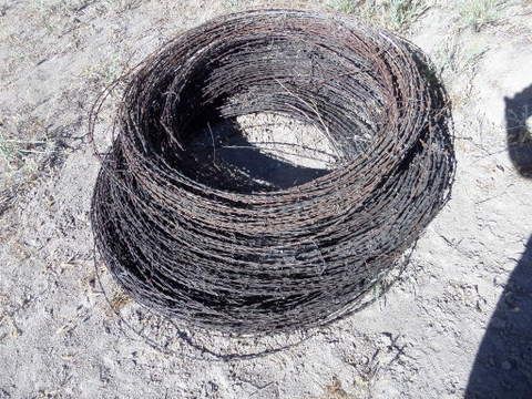 BARBED WIRE - THREE ROUNDS OF USED WIRE, FENCE STAPLES, WIRE TOOL 