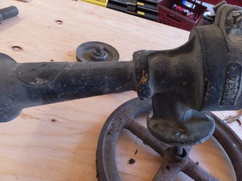 AIR HORN AND A VARIETY OF ART WORTHY OLD METAL PULLEYS, HOOKS AND MORE