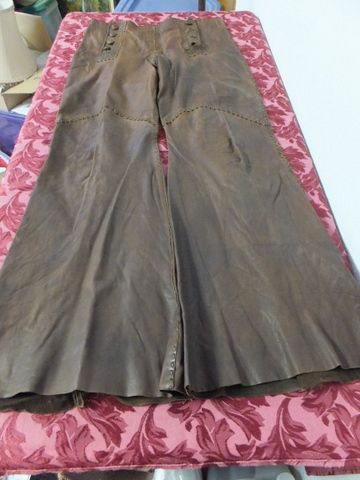 BE HIP WITH THIS 70'S CUSTOM MADE LEATHER JACKET AND BELL BOTTOM PANTS