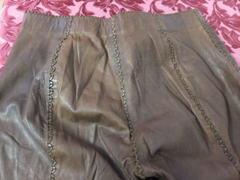 BE HIP WITH THIS 70'S CUSTOM MADE LEATHER JACKET AND BELL BOTTOM PANTS