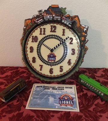 100TH ANNIVERSARY LIONEL TRAIN CLOCK AND STREET CARS