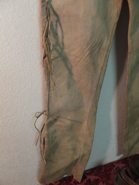 VINTAGE LEATHER PANTS, MOCCASINS, HEADBANDS AND TOMAHAWK, LEATHER GUN SCABBARD