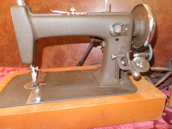 VINTAGE PORTABLE SEWING MACHINE   GET ONE THAT IS DIFFERENT FROM ALL THE SINGERS