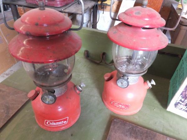 TWO VINTAGE RED COLEMAN LANTERNS WITH ORIGINAL BOXES AND EXTRA SILK  MANTELS