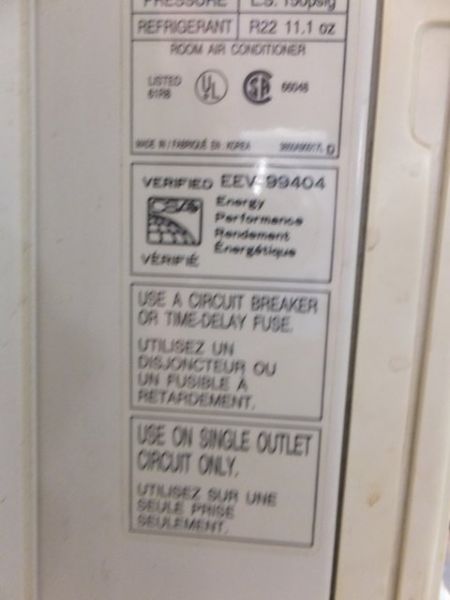 KENMORE WINDOW AC UNIT WITH REMOTE - POWERS ON AND COOLS