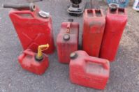 3 FIVE GALLON JERRY CANS PLUS 3 OTHER GAS CANS INCLUDING A 2 CYCLE CAN