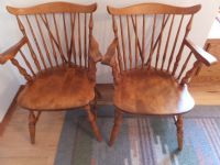 TWO SOLID WOOD MAPLE CAPTAINS CHAIRS