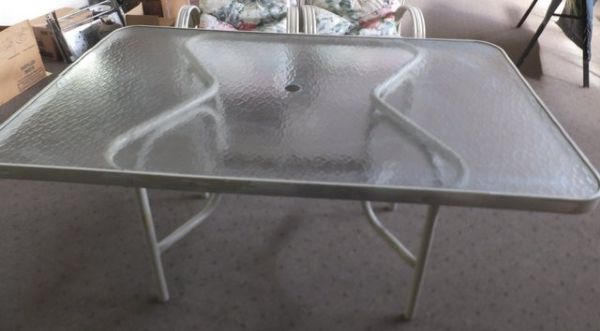 RECTANGULAR GLASS PATIO TABLE WITH FOUR CHAIRS