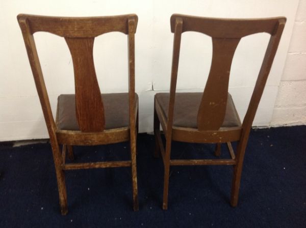 TWO ANTIQUE OAK SIDE CHAIRS WITH LEATHER SEATS