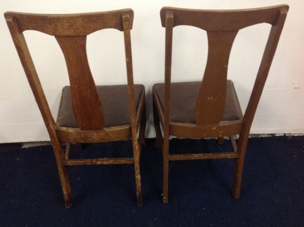 TWO ANTIQUE OAK SIDE CHAIRS WITH LEATHER SEATS
