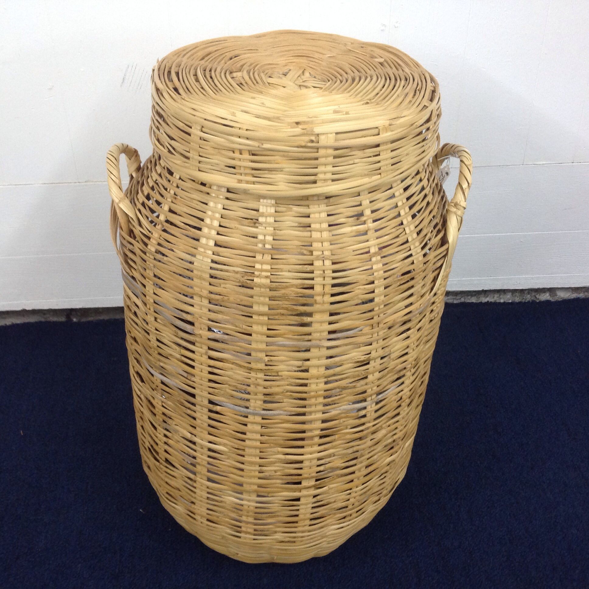 Lot Detail - WHAT IS IN THIS TALL WICKER BASKET?
