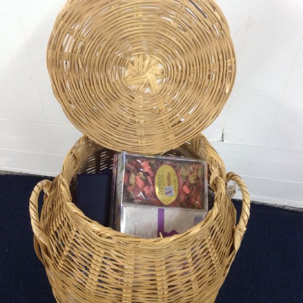 WHAT IS IN THIS TALL WICKER BASKET?
