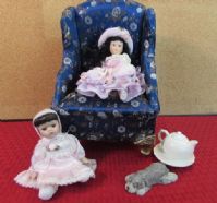 TWO BISQUE DOLLS WITH A SECRET HIDING PLACE FOR TREASURES