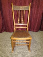 ANTIQUE SPINDLE & PRESSED BACK ROCKING CHAIR