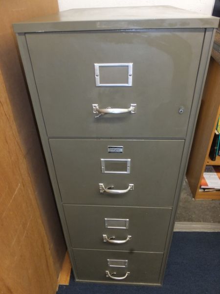 FOUR DRAWER FIRE PROOF FILE CABINET