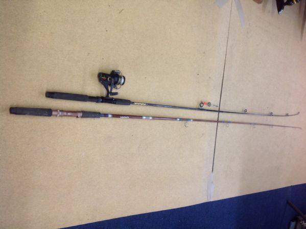 TWO FISHING POLES AND A REEL