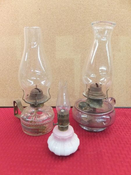 THREE ANTIQUE HURRICANE LAMPS