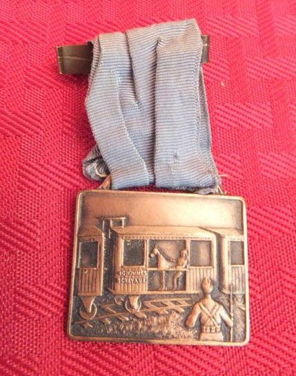 MEDAL:  40 MEN AND 8 HORSES
