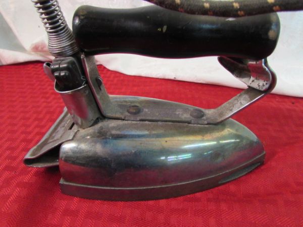 TWO VINTAGE ELECTRIC IRONS