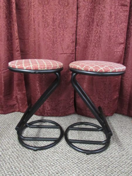 TWO METAL STOOLS WITH UPHOLSTERED TOPS