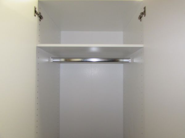 WHITE PORTABLE STORAGE UNIT WITH HANGING ROD