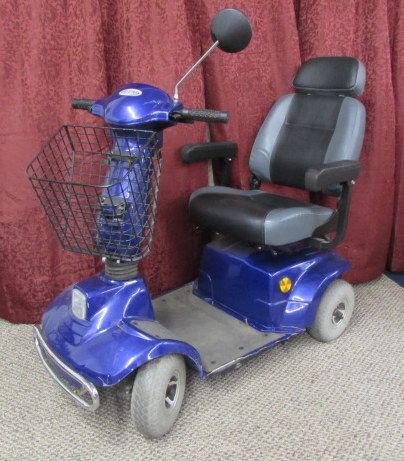 CTM MOBILITY 4 WHEEL SCOOTER WITH CHARGER.  THERE IS A RESERVE ON THIS ITEM