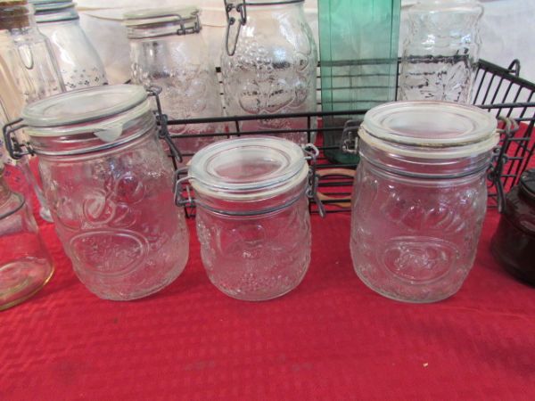 THIRTEEN GLASS JARS MOST WITH WIRE SEAL TOPS