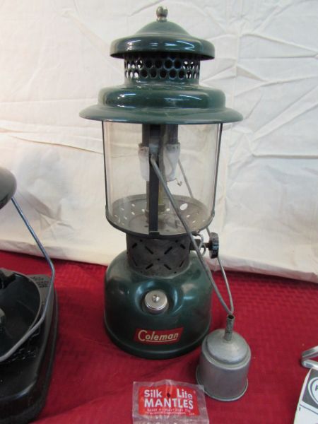 TWO COLEMAN LANTERNS, WITH ONE CASE,  A PRIMUS LANTERN & 3 COLEMAN PROPANE BOTTLES