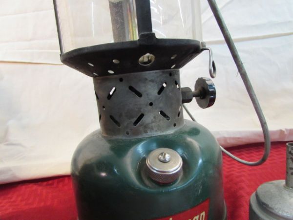TWO COLEMAN LANTERNS, WITH ONE CASE,  A PRIMUS LANTERN & 3 COLEMAN PROPANE BOTTLES