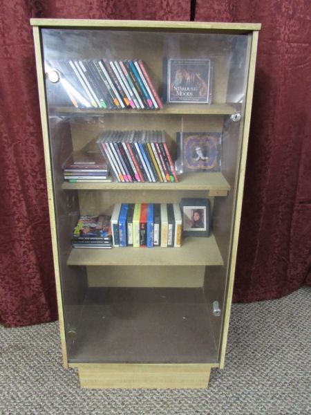 LOCKABLE DISPLAY CABINET WITH CD'S & 8 TRACKS