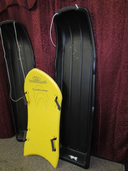 SNOW BOOGIE BOARD AND TWO TOBOGGANS