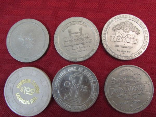 SIX VINTAGE GAMING TOKENS INCLUDING A 1ST EDITION  TOKEN 