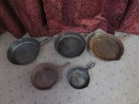 FIVE VINTAGE CAST IRON PANS MADE IN THE U.S.A.