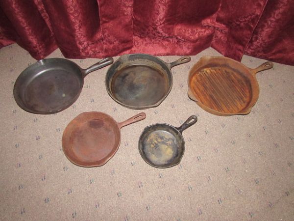 FIVE VINTAGE CAST IRON PANS MADE IN THE U.S.A.