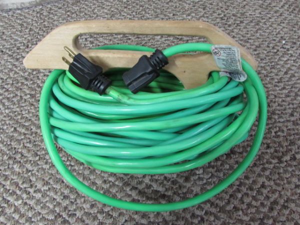 EXTENSION CORD WITH HAND-CRAFTED HOLDER