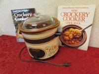 RIVAL CROCK POT WITH TWO HARDBACK COOK BOOKS.