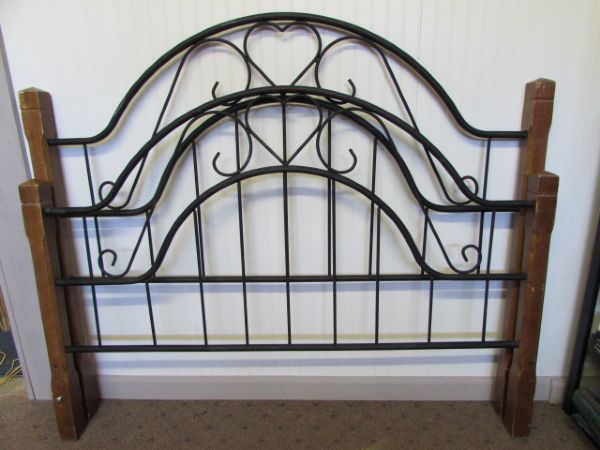 DECORATIVE HEARTS ABOUND ON THIS METAL & WOOD BED FRAME.