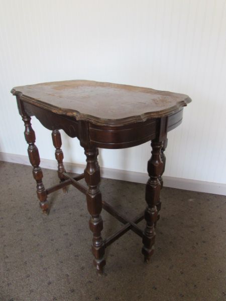 ANTIQUE ALL WOOD PARLOR TABLE WITH 6 LEGS.