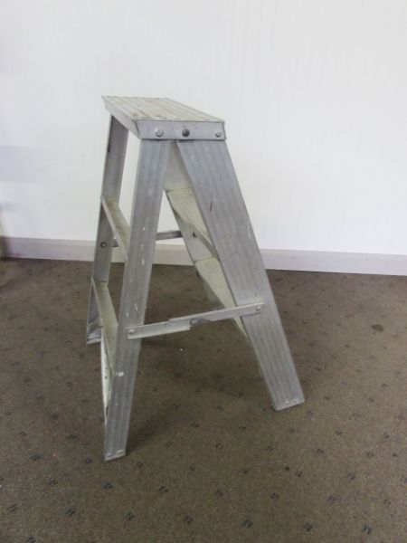 ONE 8 FOOT ALUMINUM LADDER AND 3 FOOT SMALLER STEP LADDER