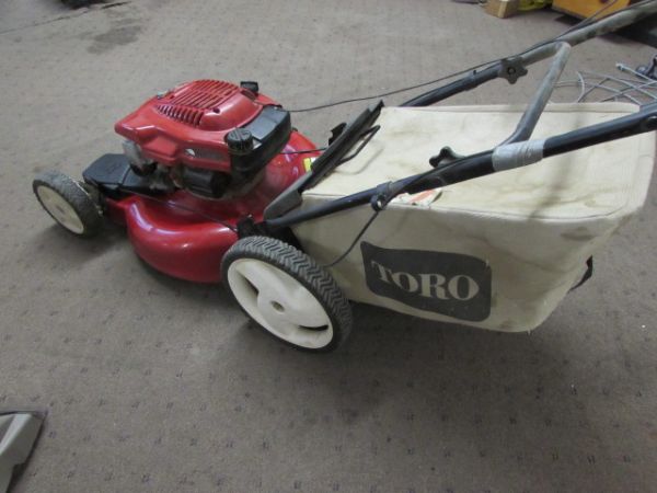 TORO-RECYCLER LAWN MOWER WITH HIGH WHEELS FOR UNEVEN TERRAIN