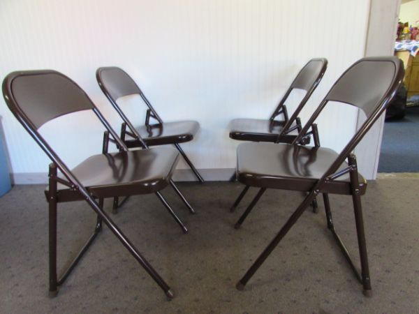 FOUR BROWN METAL FOLDING CHAIRS