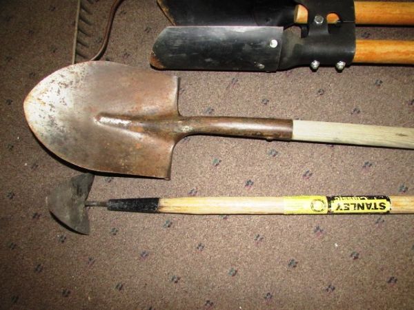 YARD TOOLS IN VERY GOOD CONDITION - POST HOLE DIGGER, HOES, SHOVEL & MORE