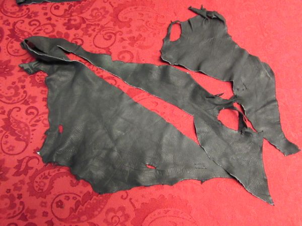 SEVERAL PIECES OF VERY SOFT BLACK SUEDE 
