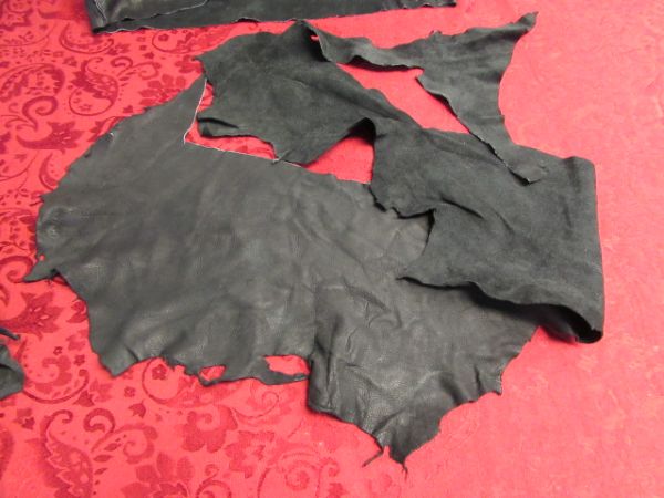 SEVERAL PIECES OF VERY SOFT BLACK SUEDE 