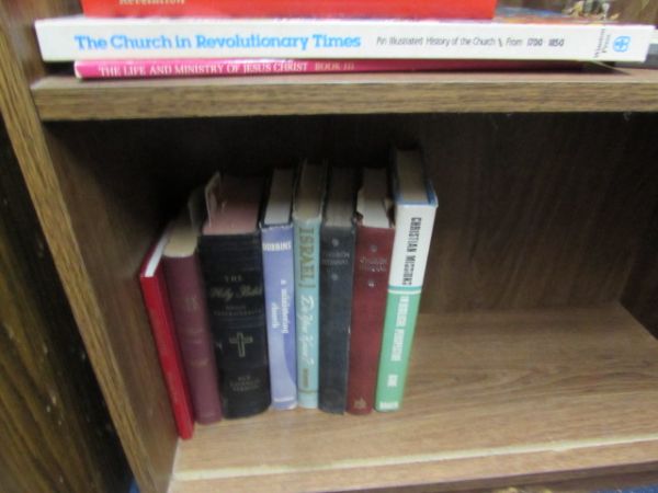 BOOKSHELF WITH A WIDE RANGE OF THEOLOGY BOOKS, BIBLES & MORE